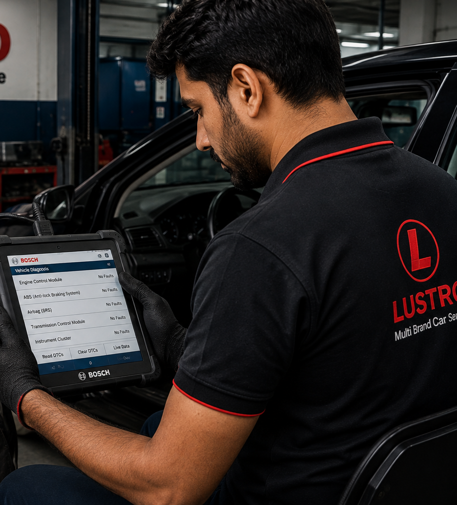 Technicians running electronic diagnostics on a vehicle