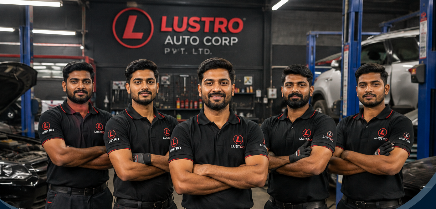 Lustro Auto Corp technicians standing together in the workshop
